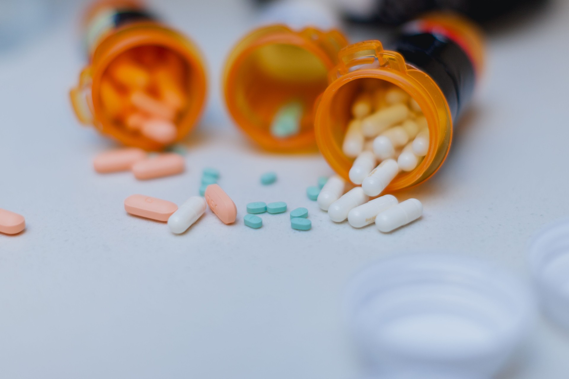 Open Pill Bottle on Kitchen Counter